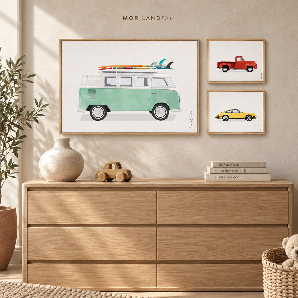 Framed vintage car canvas art set with mint surf van, red pickup truck and yellow sports car in a kids’ room