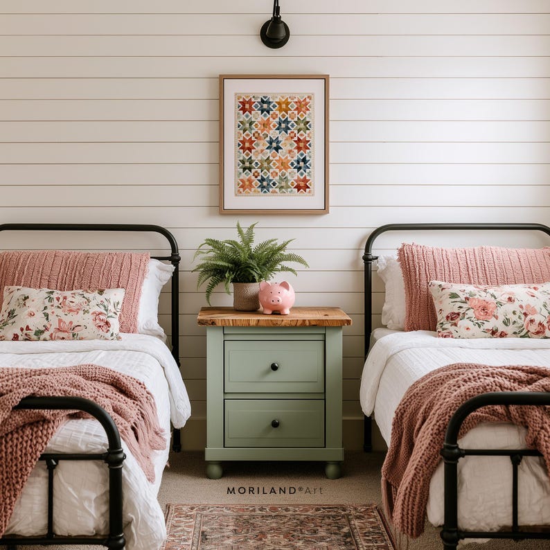 Vintage patchwork star wall art above twin beds with pink bedding and farmhouse decor