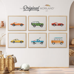 Set of 6 fine art prints featuring multicolored classic cars: a Porsche 911, Ford Bronco, Ferrari, Ford F-100 truck with surfboard, 1976 Corvette Stingray, and a VW van, all depicted in vibrant, artistic colors