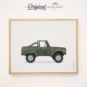 A high-quality framed canvas print featuring a side profile of a classic 1970s-style dark green Ford Bronco with an off-road roll bar, perfect for American vintage car enthusiasts.