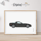 Modern heritage watercolor style illustration of a black C5 Corvette classic sports car side profile, displayed in a light wood frame for a car themed nursery or boy's room wall decor by MORILAND.