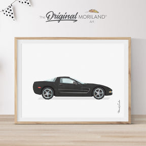 Modern heritage watercolor style illustration of a black C5 Corvette classic sports car side profile, displayed in a light wood frame for a car themed nursery or boy's room wall decor by MORILAND.
