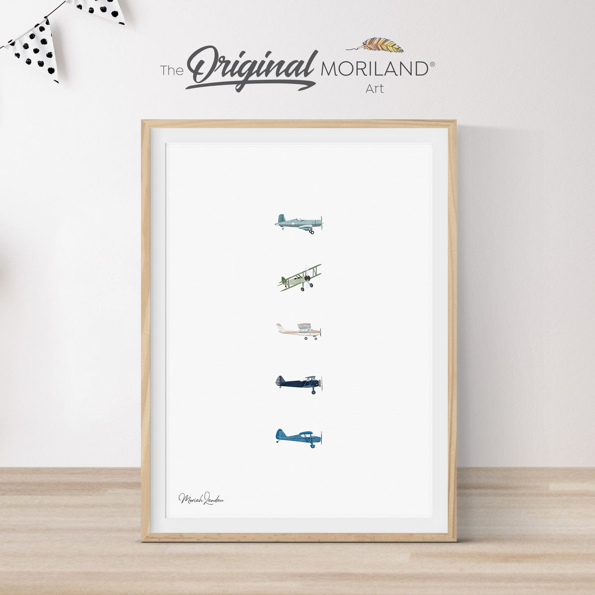 Modern heritage watercolor style illustration featuring a vertical collage of five vintage airplanes and biplanes, displayed in a light wood frame for an aviation themed nursery or kids room by MORILAND.