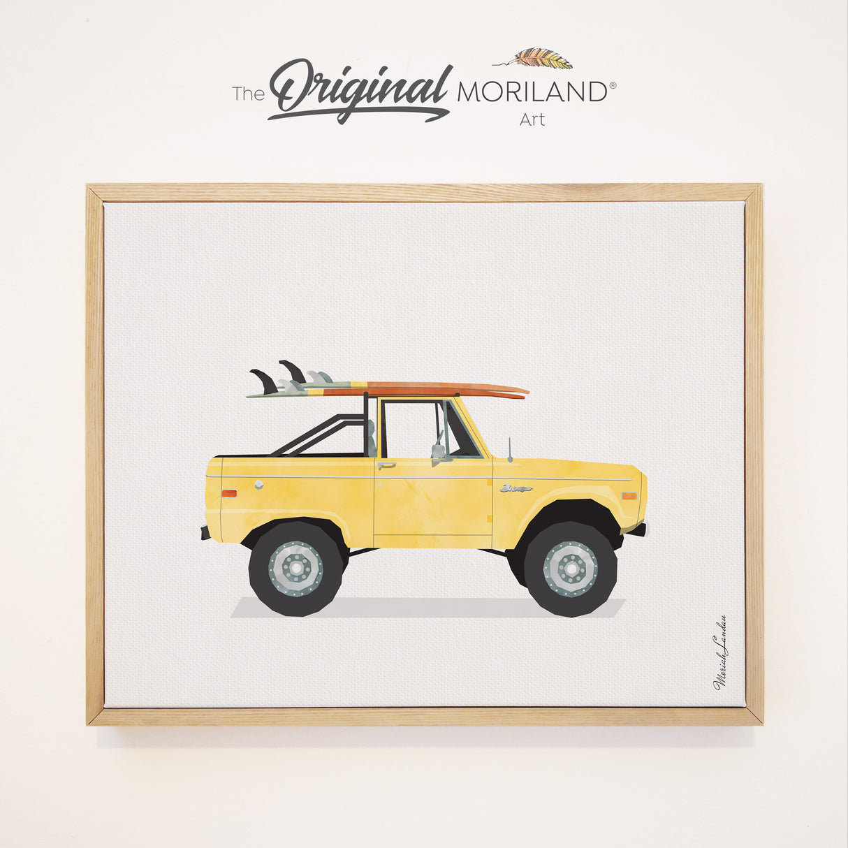 A minimalist watercolor art print of a classic yellow vintage Bronco truck with surfboards stacked flat on top, shown as a framed canvas product mockup in a natural oak frame.