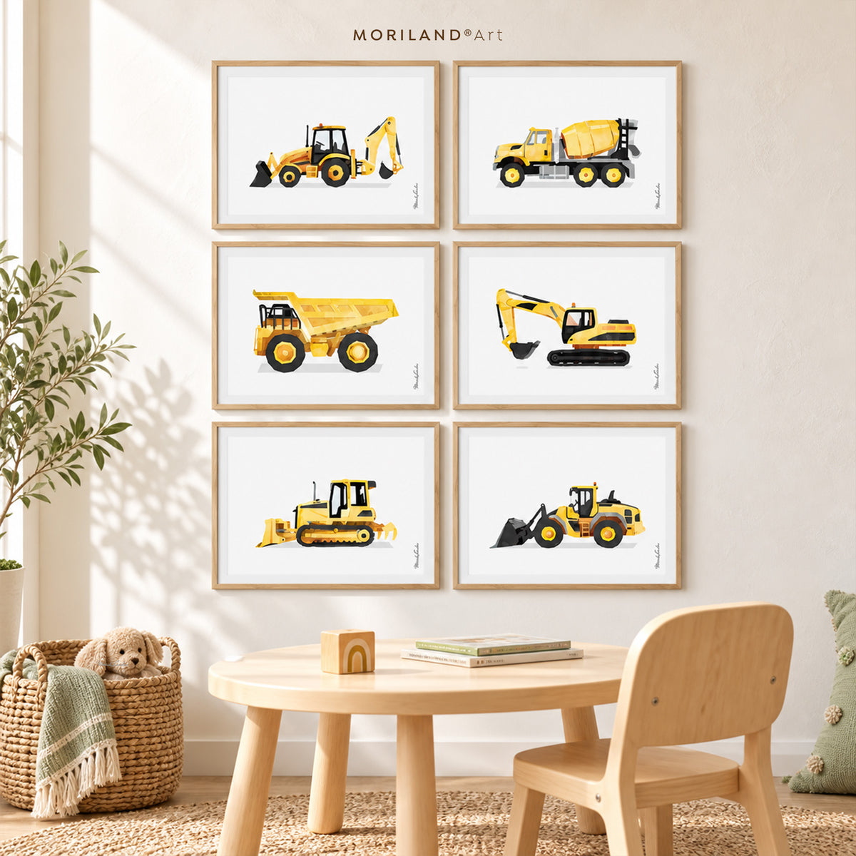 Six framed MORILAND watercolor construction vehicle prints featuring a backhoe, cement mixer, dump truck, excavator, bulldozer and front loader in a modern kids’ playroom.