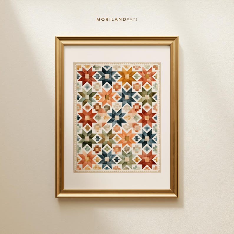 Close-up of watercolor patchwork star quilt printable in a gold frame