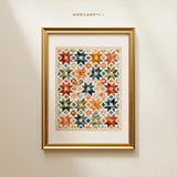 Close-up of watercolor patchwork star quilt printable in a gold frame