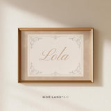 Beige watercolor personalized name print with Lola in neutral script and vintage ornamental border