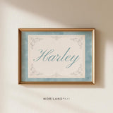 Pale blue watercolor personalized name print with Harley in soft blue script and vintage ornamental border