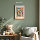 Patchwork star quilt wall art in a sage green reading nook with teddy bear and chair