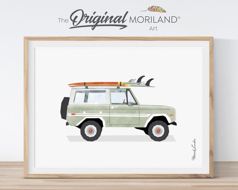 Sage green vintage surf SUV with surfboards printable nursery wall art in a natural wood frame